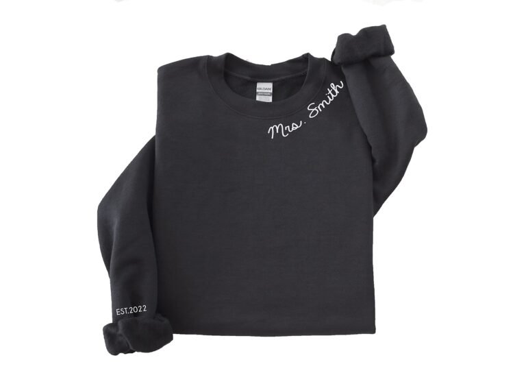 Black sweatshirt with "Mrs. Smith" and "EST.2022" in white script