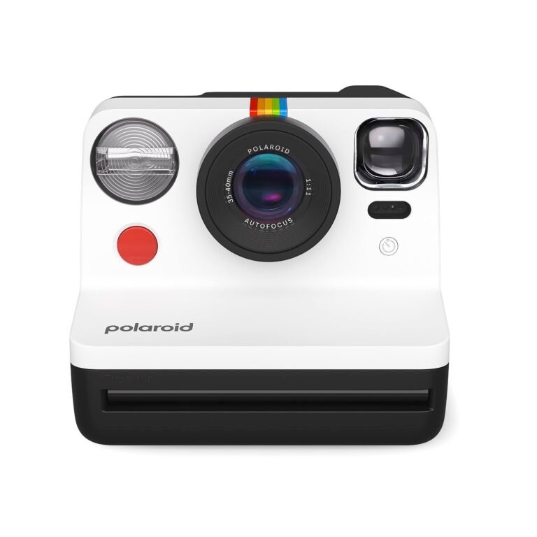 White Polaroid instant camera with black accents, rainbow stripe, and autofocus lens