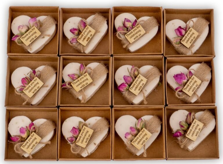 Heart-shaped soaps in boxes, decorated with roses and "Thank you" tags